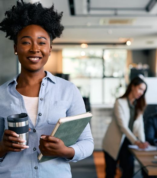portrait-of-happy-black-female-entrepreneur-in-the-2024-12-13-18-37-58-utc-min